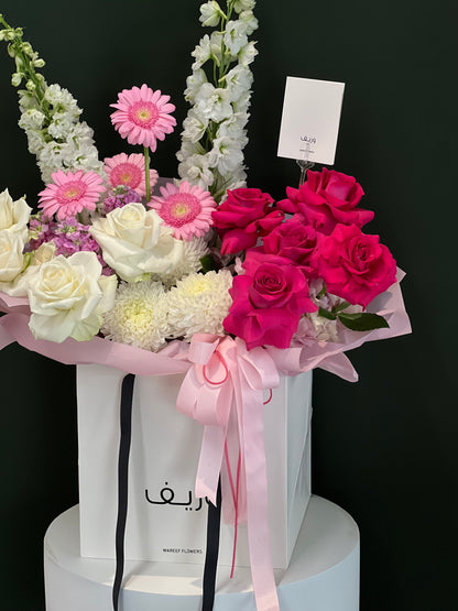 Roselle Grace Hand Bag Arrangement