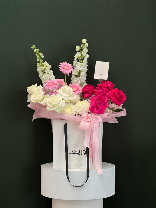 Roselle Grace Hand Bag Arrangement